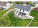 Aerial view of a home with a private, fenced backyard with a patio and plenty of green space at 1792 Salina Dr, Avon, IN 46123