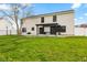 Spacious backyard featuring a pergola-covered patio and well-maintained lawn at 1792 Salina Dr, Avon, IN 46123