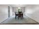 Formal dining room with wainscoting, a traditional chandelier, and large windows at 1792 Salina Dr, Avon, IN 46123