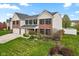 Attractive two-story home with brick and siding, a well-kept lawn, and an attached two-car garage at 1792 Salina Dr, Avon, IN 46123