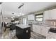 Modern kitchen with granite countertops, stainless steel appliances, and an open layout at 1792 Salina Dr, Avon, IN 46123