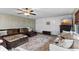 Bright living room features comfortable seating and a fireplace with mounted television at 1792 Salina Dr, Avon, IN 46123