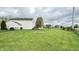 Spacious backyard with a well-maintained lawn and black chain link fence at 18017 Gasparilla Ct, Westfield, IN 46062