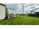 Expansive backyard featuring a deck with patio furniture at 18017 Gasparilla Ct, Westfield, IN 46062