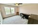 This bedroom features a large window, desk, chair, and dresser at 18017 Gasparilla Ct, Westfield, IN 46062