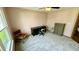 This bedroom features a large window, desk, chair, and dresser at 18017 Gasparilla Ct, Westfield, IN 46062