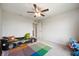 A bedroom with a racecar bed and ceiling fan at 18488 Jaden Dr, Westfield, IN 46062