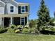 Charming home exterior with a lush, landscaped front yard and manicured lawn at 18488 Jaden Dr, Westfield, IN 46062