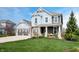Inviting two-story home with a well-maintained lawn and charming curb appeal at 18488 Jaden Dr, Westfield, IN 46062
