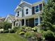 Charming home exterior with a lush, landscaped front yard and manicured lawn at 18488 Jaden Dr, Westfield, IN 46062