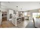 Bright kitchen with granite countertops, stainless steel appliances, a large island, and modern design at 18488 Jaden Dr, Westfield, IN 46062
