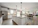 Bright kitchen features granite countertops, stainless steel appliances and island at 18488 Jaden Dr, Westfield, IN 46062