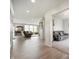 Open floor plan to living room featuring wood floors, lots of windows, and neutral paint at 18488 Jaden Dr, Westfield, IN 46062