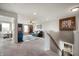 Spacious living room with a comfortable black sofa, patterned rug, and neutral walls at 18488 Jaden Dr, Westfield, IN 46062