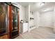 Well-organized mudroom with a built-in bench, storage cabinets, and a display case for sports equipment at 18488 Jaden Dr, Westfield, IN 46062