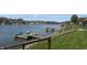 Beautiful waterfront property with docks, kayaks, and manicured lawns at 1959 Crystal Bay East Dr, Plainfield, IN 46168