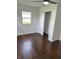 Cozy bedroom featuring wood floors and a closet at 2185 W State Road 234, Fortville, IN 46040