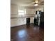 A modern kitchen with white cabinets, sleek countertops, and stainless steel appliances at 2185 W State Road 234, Fortville, IN 46040