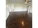 Spacious living room featuring hardwood floors and a ceiling fan at 2185 W State Road 234, Fortville, IN 46040