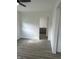 Living room with hardwood floors and open doorway at 2185 W State Road 234, Fortville, IN 46040