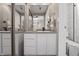Bright bathroom with a granite countertop and modern fixtures, complemented by stylish white tiling at 226 N Cleveland St # 226C, Indianapolis, IN 46204