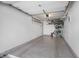 Clean and organized garage with epoxy floor, ample space, and bike storage racks at 226 N Cleveland St # 226C, Indianapolis, IN 46204