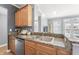 Kitchen with granite countertops, stainless steel appliances, and ample cabinet space at 226 N Cleveland St # 226C, Indianapolis, IN 46204