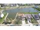 A high angle shot showcases the home's placement next to a picturesque pond within the well planned community at 2441 Longleaf Dr, Greenwood, IN 46143