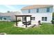 Backyard patio with pergola and outdoor seating, perfect for entertaining at 2441 Longleaf Dr, Greenwood, IN 46143