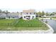 Lovely backyard with pergola, fire pit, lawn, and pond access at 2441 Longleaf Dr, Greenwood, IN 46143