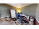 This cozy, carpeted bedroom features a gaming computer set up and neutral paint at 2441 Longleaf Dr, Greenwood, IN 46143