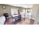 This dining area with hardwood floors sits next to the bright kitchen, perfect for entertaining at 2441 Longleaf Dr, Greenwood, IN 46143