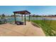 Stamped concrete patio with pergola and backyard views of the water at 2441 Longleaf Dr, Greenwood, IN 46143