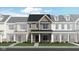Charming two-story townhome with stone accents, vertical siding, and a welcoming entrance at 2670 Marjorie Ln, Plainfield, IN 46168