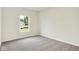 Bedroom with neutral carpeting and natural light from window at 2712 Glade Ave, Plainfield, IN 46168