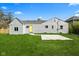 Exterior view of a home with a large grassy backyard at 2833 Hervey St, Indianapolis, IN 46203