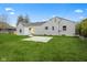 Home exterior with a large backyard and blue sky at 2833 Hervey St, Indianapolis, IN 46203