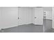 Unfinished basement with white walls and grey floor at 2833 Hervey St, Indianapolis, IN 46203