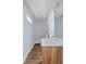 Updated bathroom with a vanity, tiled shower, and newer fixtures at 2833 Hervey St, Indianapolis, IN 46203