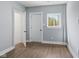 Bright bedroom with natural light, hardwood flooring, and fresh neutral paint at 2833 Hervey St, Indianapolis, IN 46203
