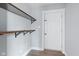 This hallway has open shelves and newer luxury vinyl plank flooring at 2833 Hervey St, Indianapolis, IN 46203