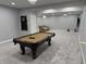 Finished basement has a pool table, recessed lighting, and plenty of space for entertaining at 3389 Grant Ct, Columbus, IN 47203