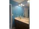 Bathroom features a double sink vanity with a large mirror and modern fixtures at 3389 Grant Ct, Columbus, IN 47203