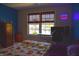 Bedroom with large window and desk area at 3389 Grant Ct, Columbus, IN 47203