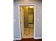 Hall tree with bench seating, hooks, tile floors, and white trim at 3389 Grant Ct, Columbus, IN 47203