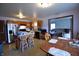Open-concept kitchen flowing into the living area, featuring an island and modern appliances at 419 W Osage St, Greenfield, IN 46140