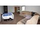 Bright and airy living room with large windows, providing ample natural light at 419 W Osage St, Greenfield, IN 46140