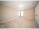 Cozy bedroom featuring carpet flooring and a window at 4622 Crosby Buck Dr, Indianapolis, IN 46237