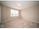 Carpeted bedroom featuring one window and neutral wall color at 4622 Crosby Buck Dr, Indianapolis, IN 46237