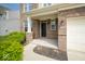 Inviting covered porch with brick columns and a dark front door, enhancing curb appeal at 4622 Crosby Buck Dr, Indianapolis, IN 46237